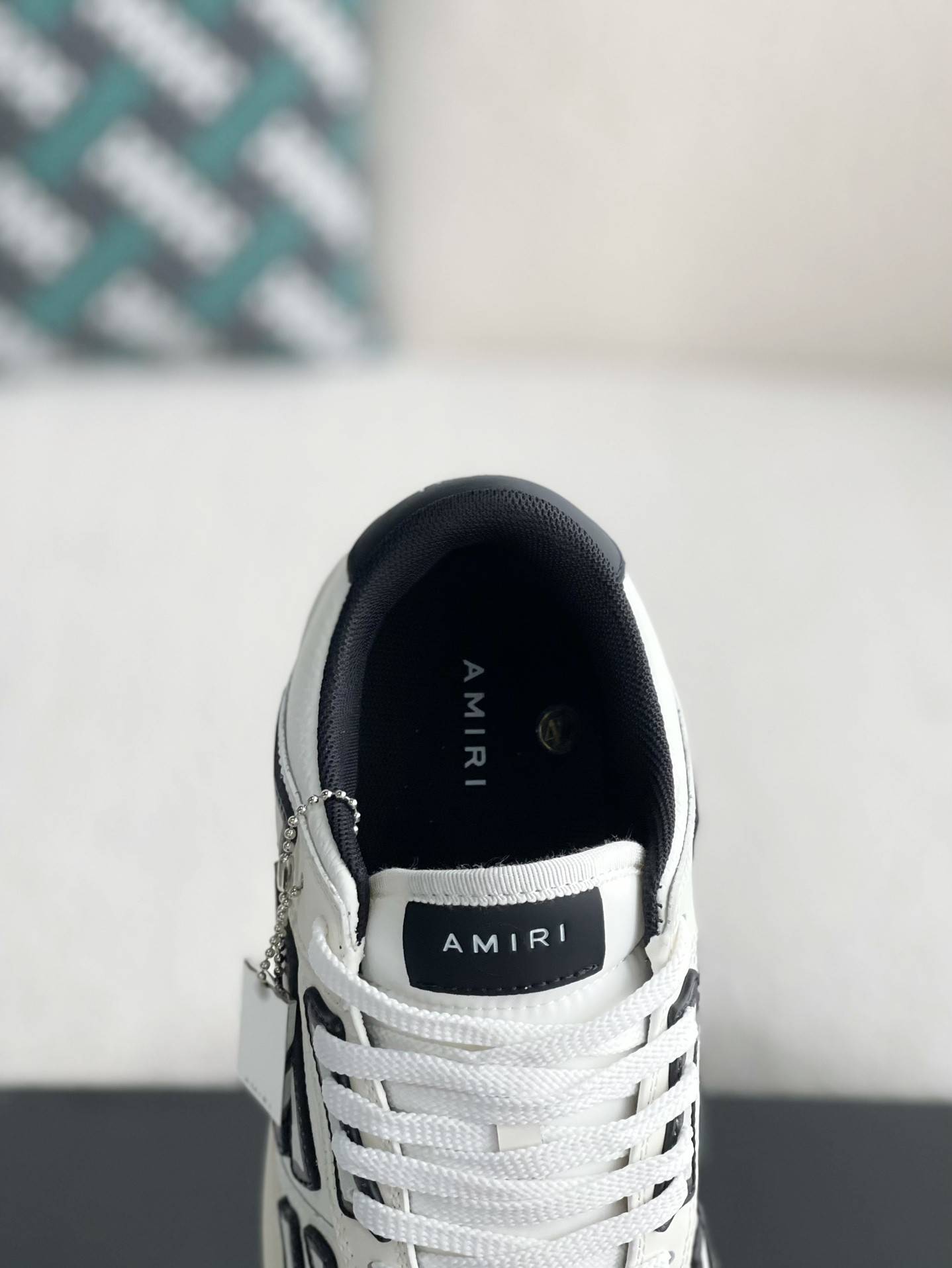 A*RI Bone Sneakers