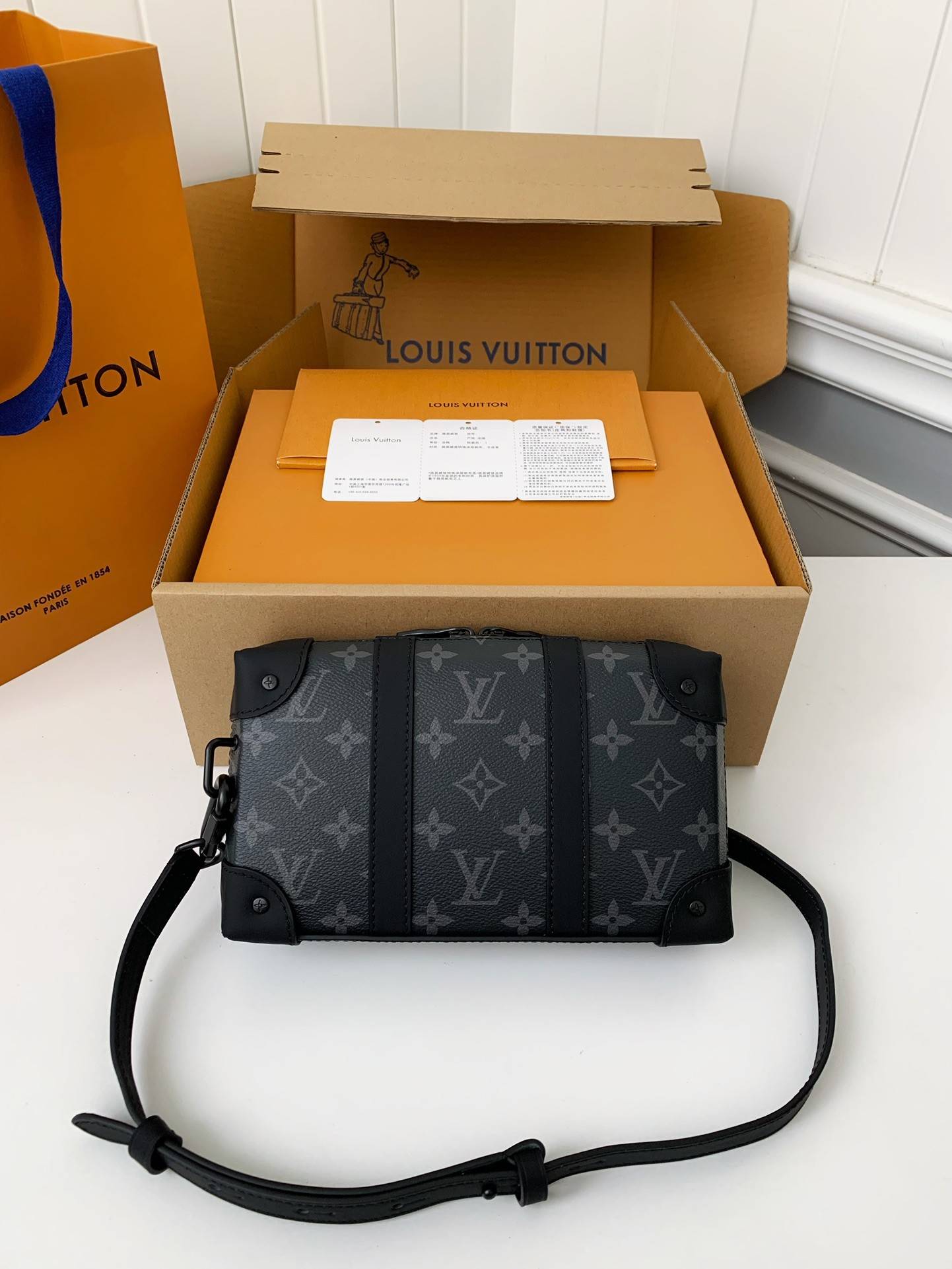 L*V''s new Sac Plat Horizontal Zippé men''s black flower briefcase M45165 Size:  22.5*14*5cm